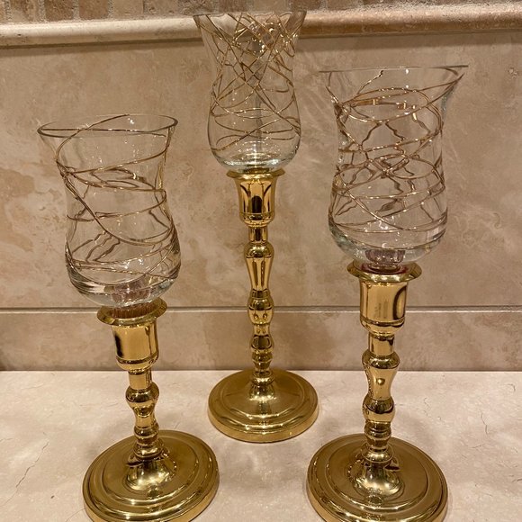 Beautiful brass Partylite candle holders with Calypso gold glass votive holders.
